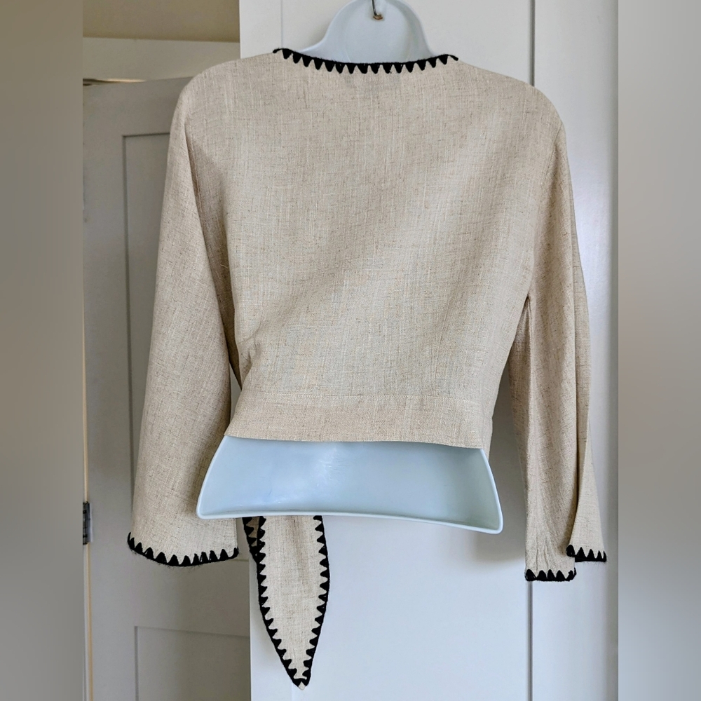 Lulu's Allamenda Beige Wrap Blouse with Black Edging. Small - Picture 6 of 6